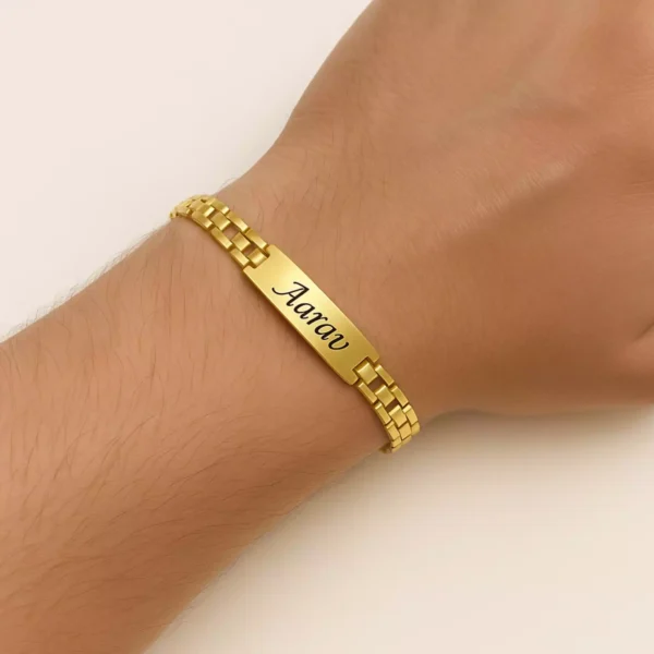 Gold custom bracelet with "Aarav" engraved – Worn on wrist, personalized men's accessory