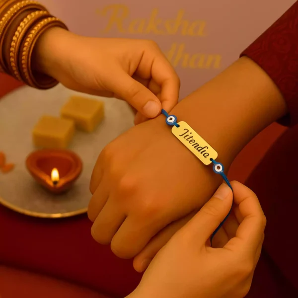 Evil Eye Personalized Rakhi Being Tied on Hand