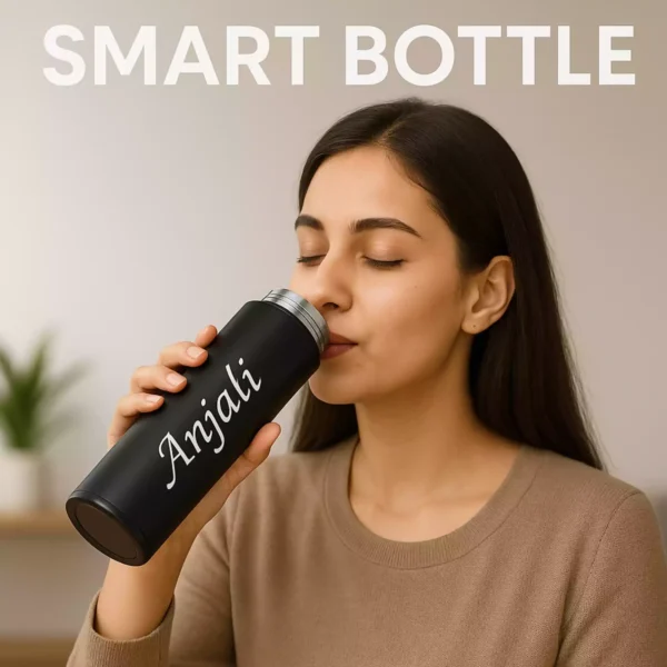 Woman drinking from a black smart bottle personalized with the name Anjali