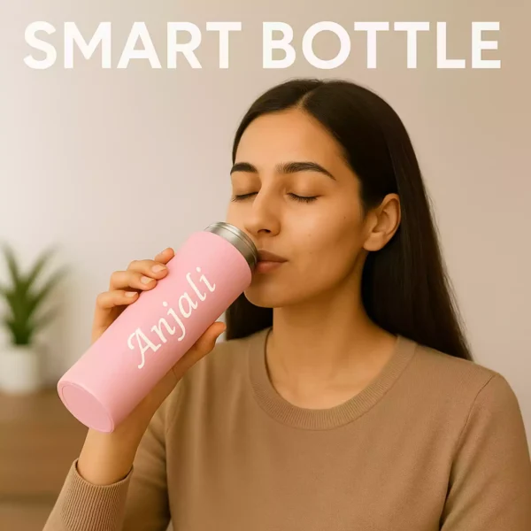 Woman drinking from a pink personalized smart bottle