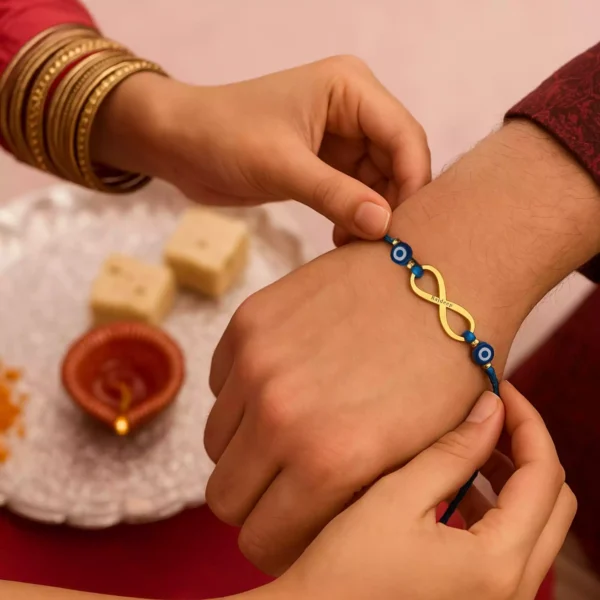 Sister tying Infinity Evil Eye Rakhi