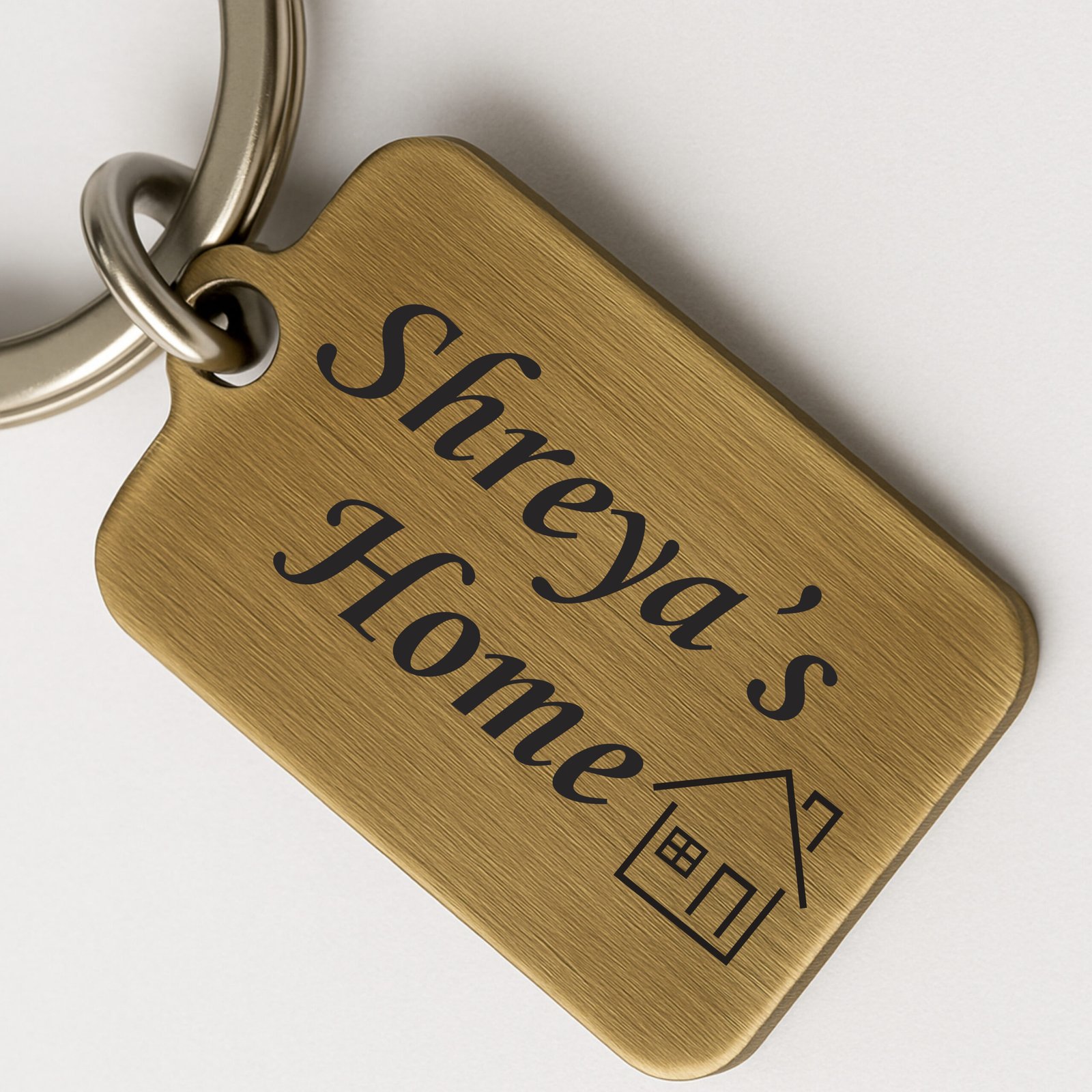 Antique brass personalized home keychain with custom engraved text for house keys and luxury home organization