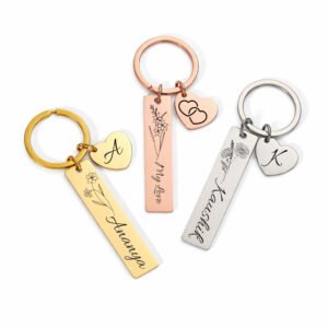 Personalized double sided name keychain in gold rose gold and silver with heart charm and birth flower engraving