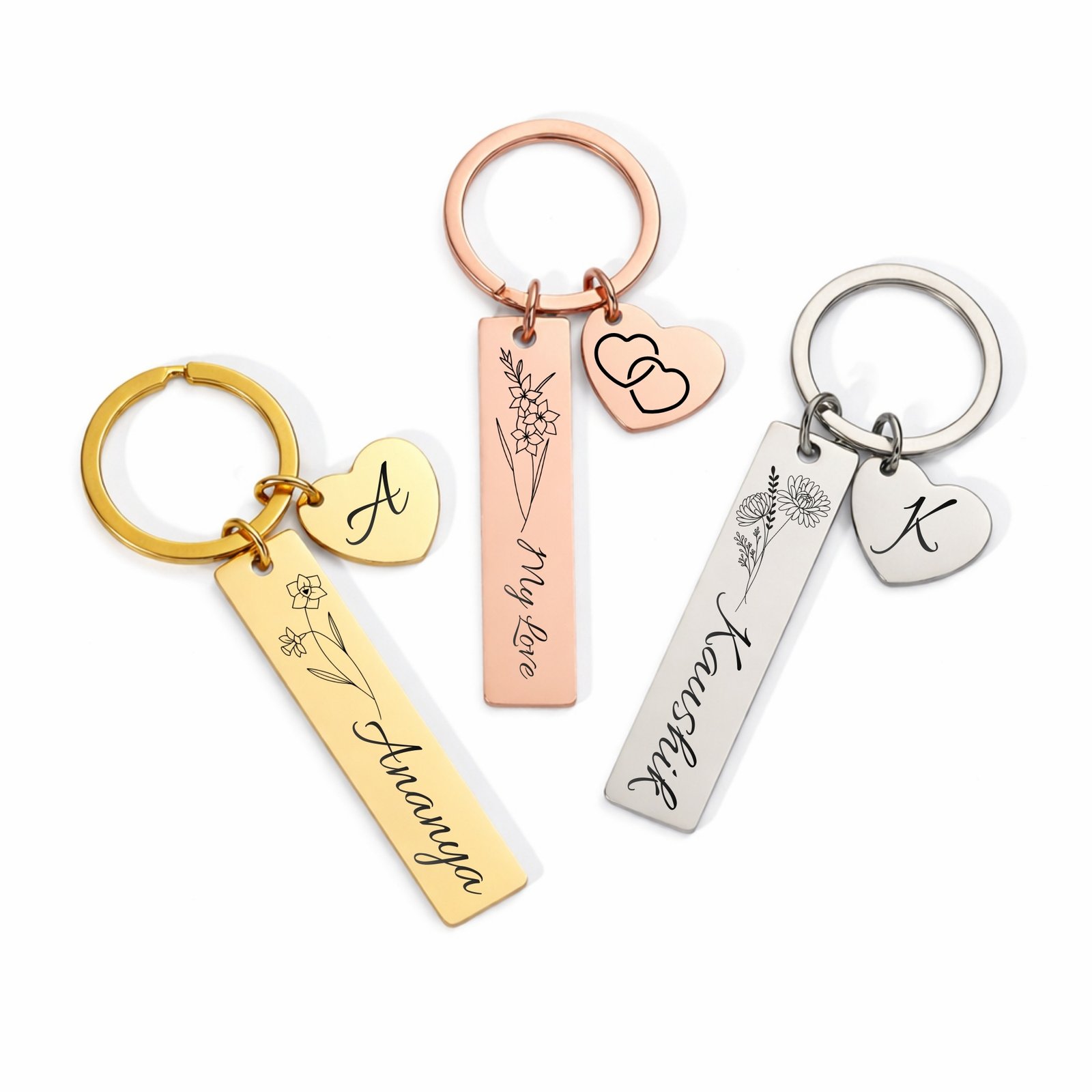 Personalized double sided name keychain in gold rose gold and silver with heart charm and birth flower engraving