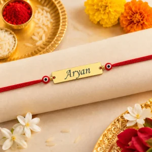Personalized Red Evil Eye Rakhi with custom engraved gold name plate for brother