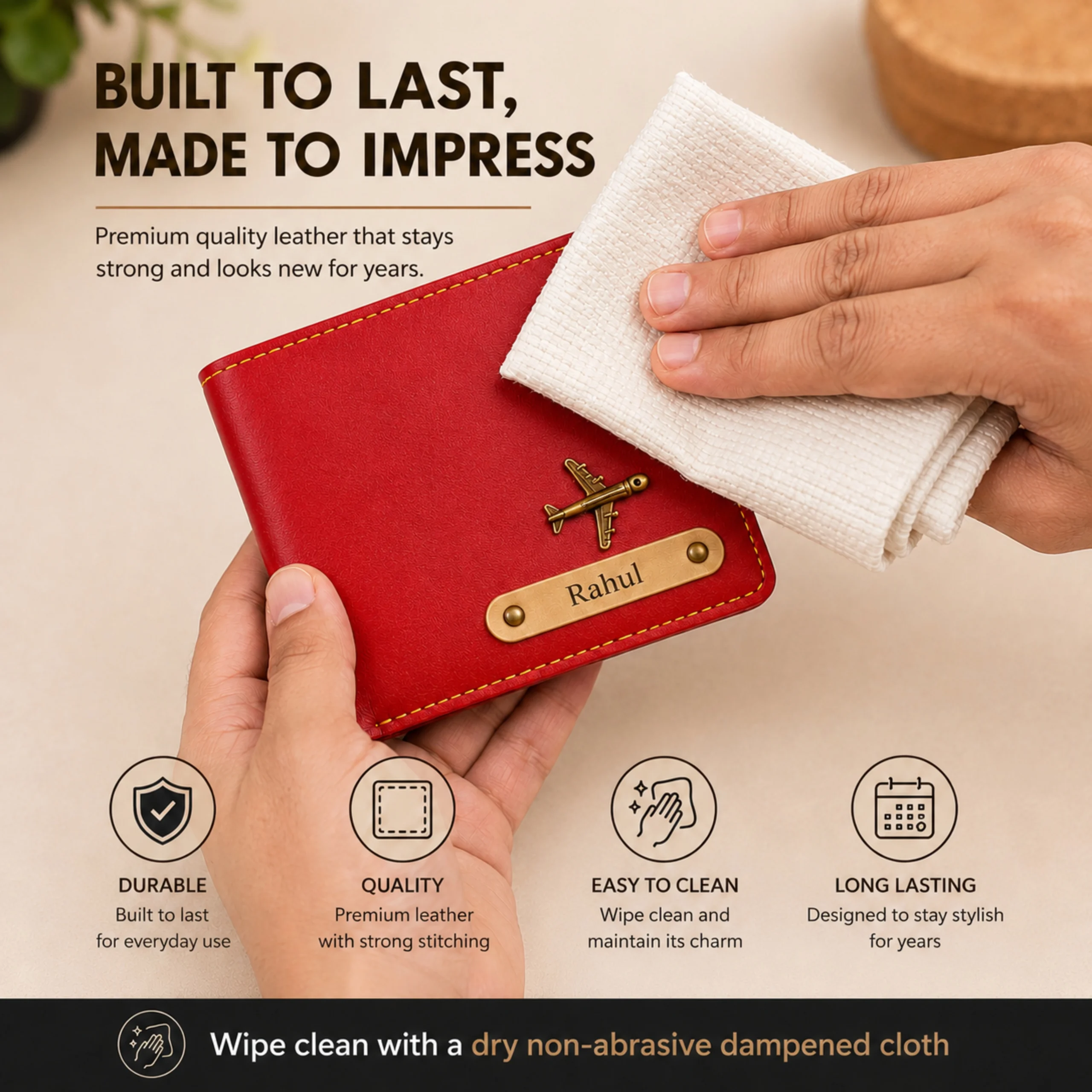 Red personalized leather wallet being cleaned with cloth showing durable and easy maintenance features