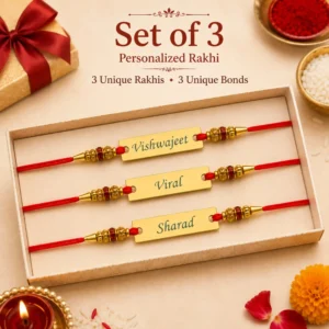 Set of 3 personalized name rakhis with engraved stainless steel name plates, red threads, decorative gold beads, and festive Raksha Bandhan gift box presentation.