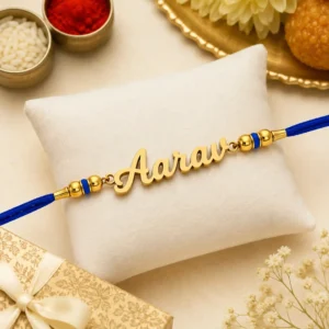 Personalized name rakhi with blue thread and gold plated custom name plate for brother, premium Raksha Bandhan gift.
